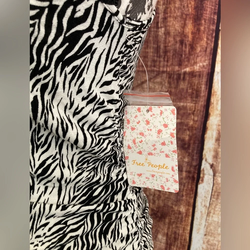 Free People | NWT Animal Print RacerBack Tank